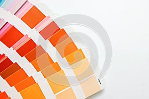 Color guide swatches of orange and red warm tones