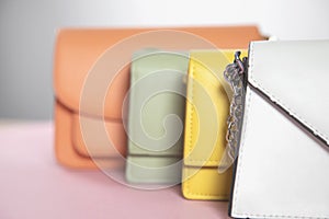 Color handbags on the pink background