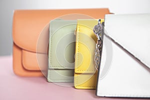 Color handbags on the pink background