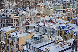 Color houses in the classic style covered with snow photo