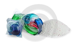 Color laundry capsules and detergent powder on white background