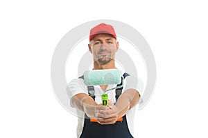 Color man. Man painter decorator isolated on white. Handy man hold paint roller. Work man wear working clothes. Renewal