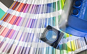 Color management in printing process with color swatches and densitometer