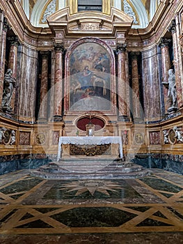 Color marble altarpiece with columns and painting in the church Santa Maria Maddalena dei Pazzi, Florence ITALY