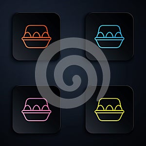 Color neon line Chicken egg in box icon isolated on black background. Set icons in square buttons. Vector