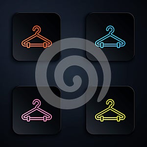 Color neon line Hanger wardrobe icon isolated on black background. Cloakroom icon. Clothes service symbol. Laundry