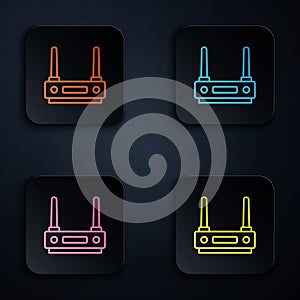 Color neon line Router and wi-fi signal icon isolated on black background. Wireless ethernet modem router. Computer