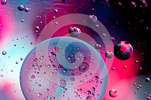 Color oil drop abstract background, Flat images with blurred and sharpen circles together with multicolor background. Stiring