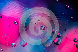 Color oil drop abstract background, Flat images with blurred and sharpen circles together with multicolor background. Stiring