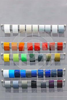 Color paint chart to choose color hue in car showroom