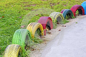 Color painted tires in a kids park