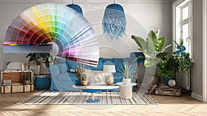 Color palette samples over old style living room in blue tones, sofa, carpet, and rattan lamps, tables with decors and potted