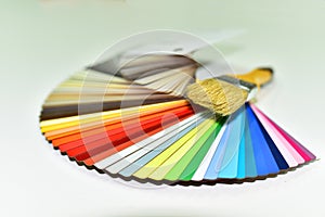 Color palette swatches with paint brush. Palette of different colors and shades on white background. Color catalog for tinting