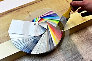 Color palette swatches with paint brush. Palette of different colors and shades on white background. Color catalog for tinting