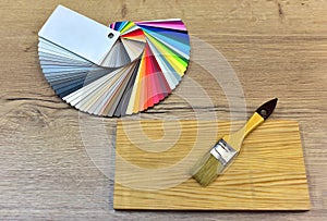 Color palette swatches with paint brush. Palette of different colors and shades on white background. Color catalog for tinting