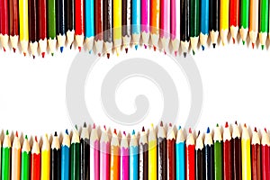 Color palette wooden crayon pencils at white background