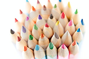 Color palette wooden crayon pencils at white background