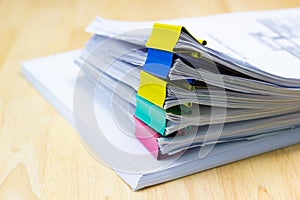 Color paper clip with Stack of papers documents