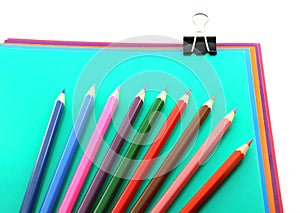 Color papers, black clip and color pencils