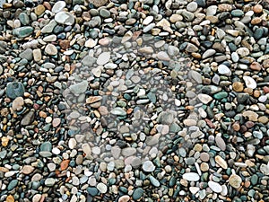 Color pebbles on the beach