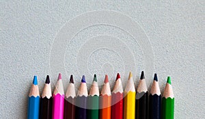 Color pencil with copy space isolated on whtie background,education frame concept