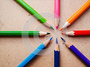 Color pencil from education. Colorful on wood background.