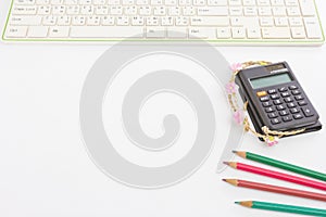 Color pencil and keyboard and calculator,business concept photo