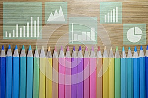 Color pencils with business graphs and charts, Stock market investment trading, Statistic and data, Financial and economy