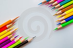 Color pencils isolated over white background close up