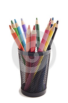 Color pencils in metal vase photo