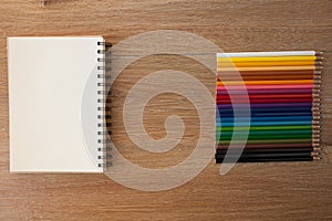 Color pencils with notebook