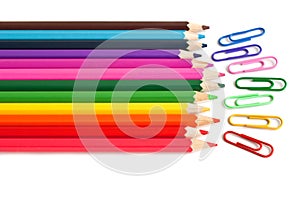 Color pencils and paper clips, office stationery photo