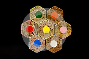 color pencils upside down arranged in hexagon