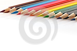 Color pencils white background. Close up, selective focus