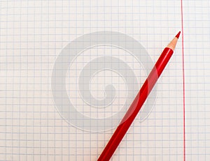 Color pencils on white background, notebook for pencils