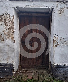 Little wooden doors on old mud house in Vojvodina Serbia photo