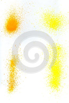 Color pigment sprinkles on white paper