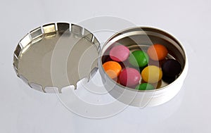Color pills in Metallic pillbox