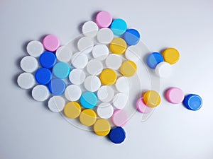 Color plastic bottles caps heart