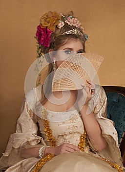 Color  portrait of beautiful woman dressed in rococo 1700s fashion