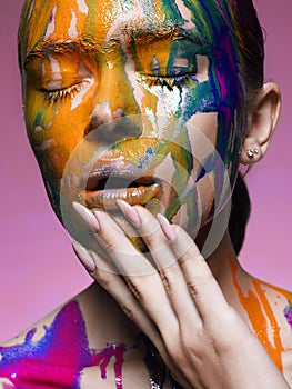 Color portrait of Girl in Paint.