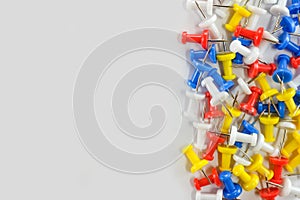 Color push pins red, yellow, white, and blue group on the right of white background