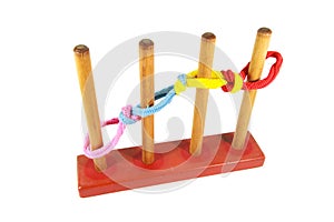 Color rubber hair bundle isolated with wooden toy on white background