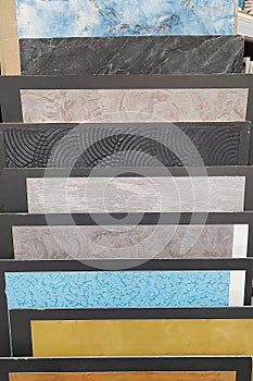 Color samples of decorative plasters at the store