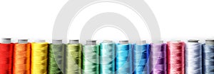 Color sewing threads on white background