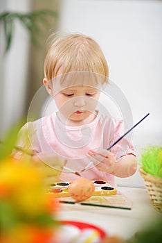 Color smeared baby painting Easter egg