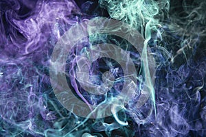 Color smoke on black background