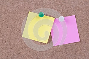 Color sticky note on cork board with blank notes, empty space for text