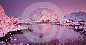 Color sunset nature winter panorama over Reine village, Lofoten islands, Norway