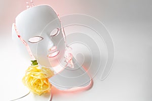 Color therapy mask glowing pink with rose